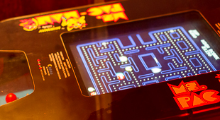 a photo of ms. pac-man on an arcade system from the cellar door in vancouver used to illustrate a blog post on women in games